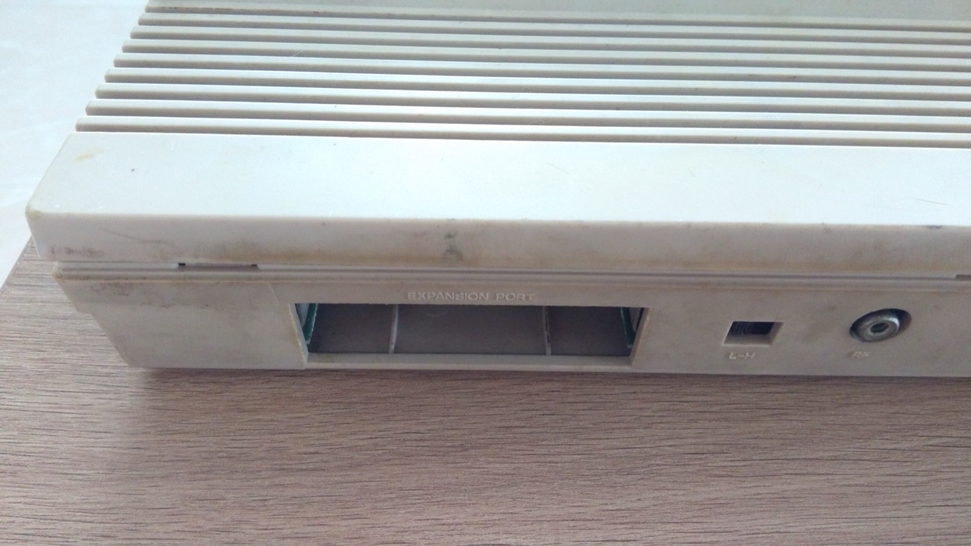 Rear ports of the C64 case during cleaning